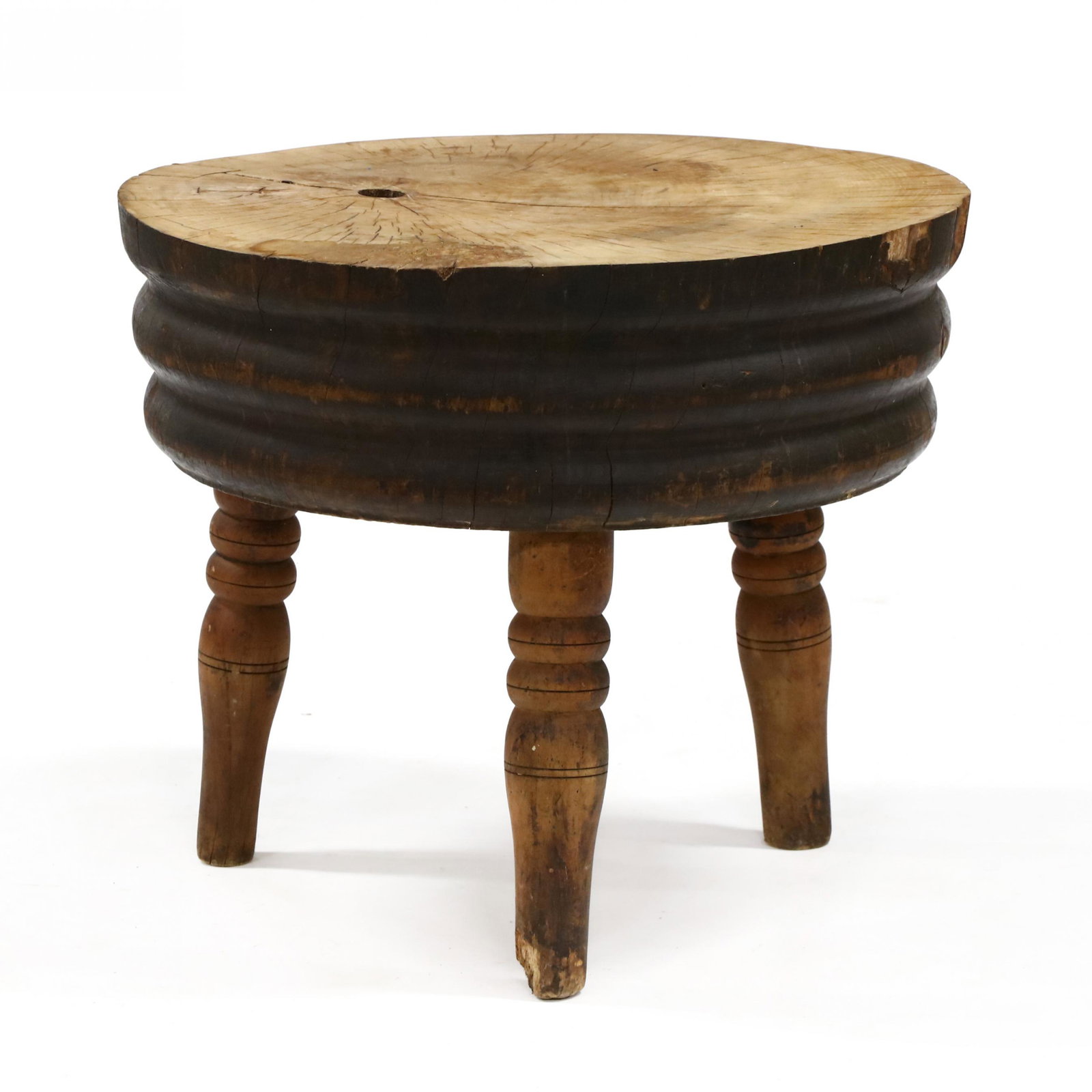 Unusual Antique Solid Cherry Butcher Block Table: Unusual Antique Solid Cherry Butcher Block Table late 19th century, ten inch thick hand-turned circular one-board top with reeded edge, raised on three turned peg legs. 27 x 31 in. diameter This was u