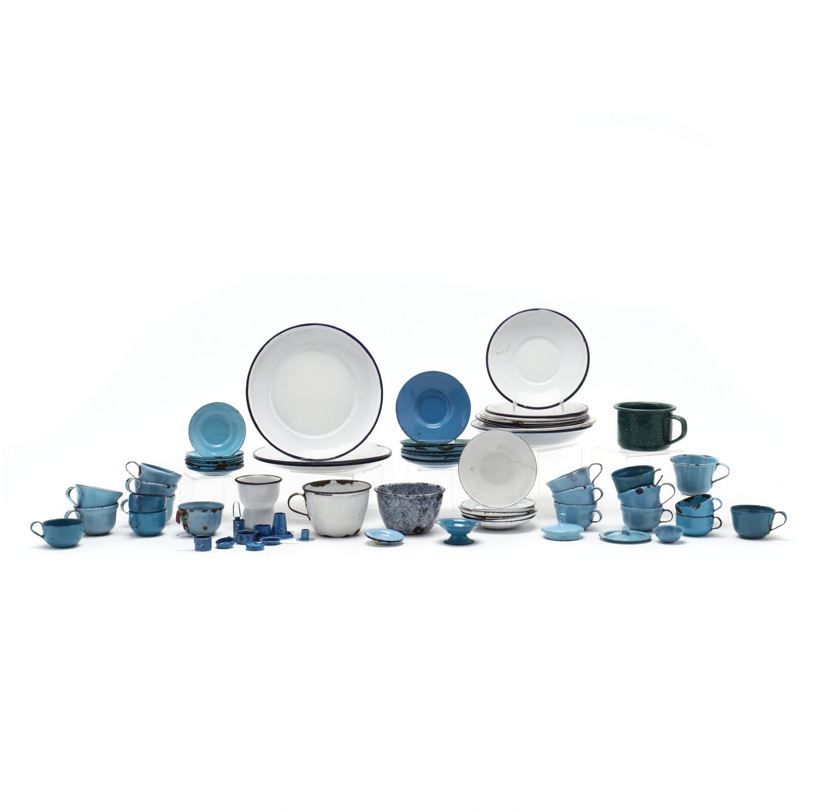 Group of Child's Graniteware Play Set: Group of Child's Graniteware Play Set20th century, over (40) pieces of child size and miniature plates, doll house cookware. Largest Plate 6 in.; Cup 2 in. From the Personal Collection of Bob Timberla