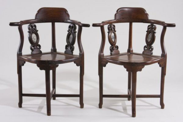 Pair of Chinese Corner Chairs, ca. 1900,: Pair of Chinese Corner Chairs, ca. 1900, rosewood, applied shaped crest, pierced and carved panels with marble inset, beveled plank seat, "X" stretcher base with shaped foot. 34" x 27" x 21" Repairs t