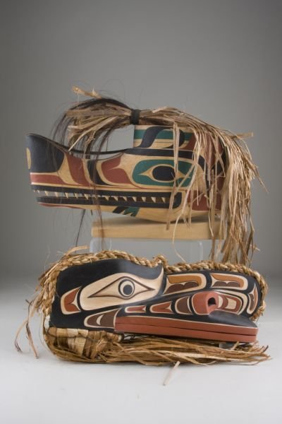 (2) Northwest Coast Carved & Painted Animal Masks,: (2) Northwest Coast Carved & Painted Animal Masks, contemporary, effigy masks with straw and horse hair, (16" to 17"), one signed on interior in paint "Wolfcrest mask MAKAH" and "AMICA Vogel Sallawigh