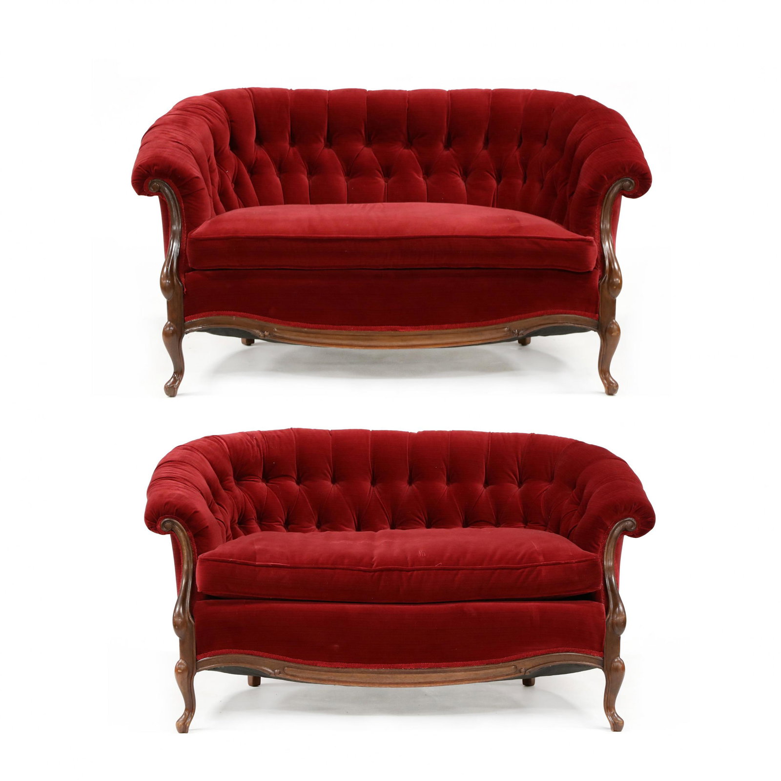 Pair of American Rococo Style Red Velvet Tufted Settees: Pair of American Rococo Style Red Velvet Tufted Settees second half of the 20th century, walnut, with custom red velvet upholstery, loose cushions, on cabriole legs. 31 x 57 x 29 in. The Collection of