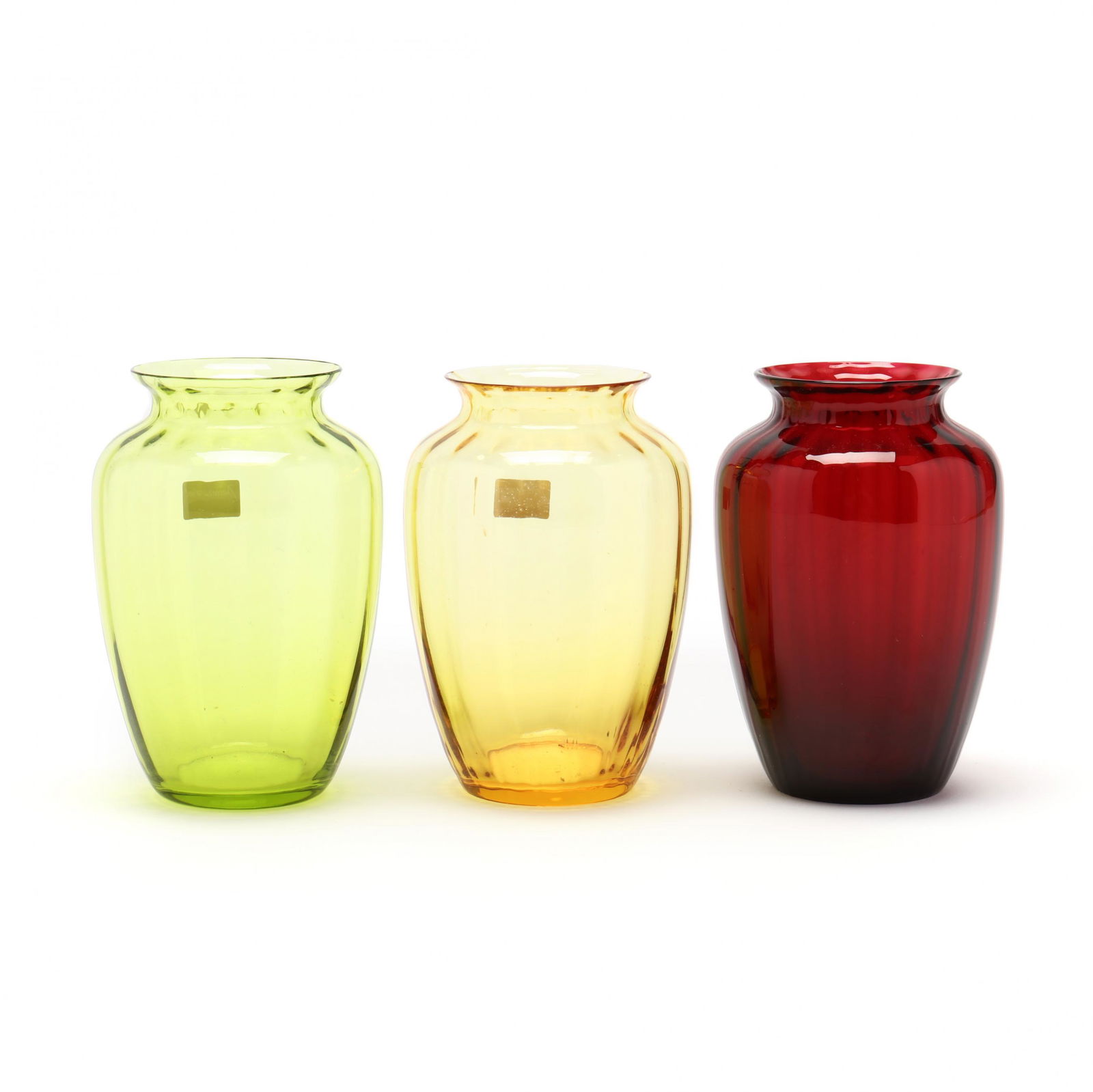 Three Baccarat Colored Crystal Cabinet Vases: Three Baccarat Colored Crystal Cabinet VasesFrance, in peridot green, yellow topaz and ruby red, signed. 4.25 in. The Collection of Mr. Duggins and Mr. Dunn, High Point, North Carolina Additional high