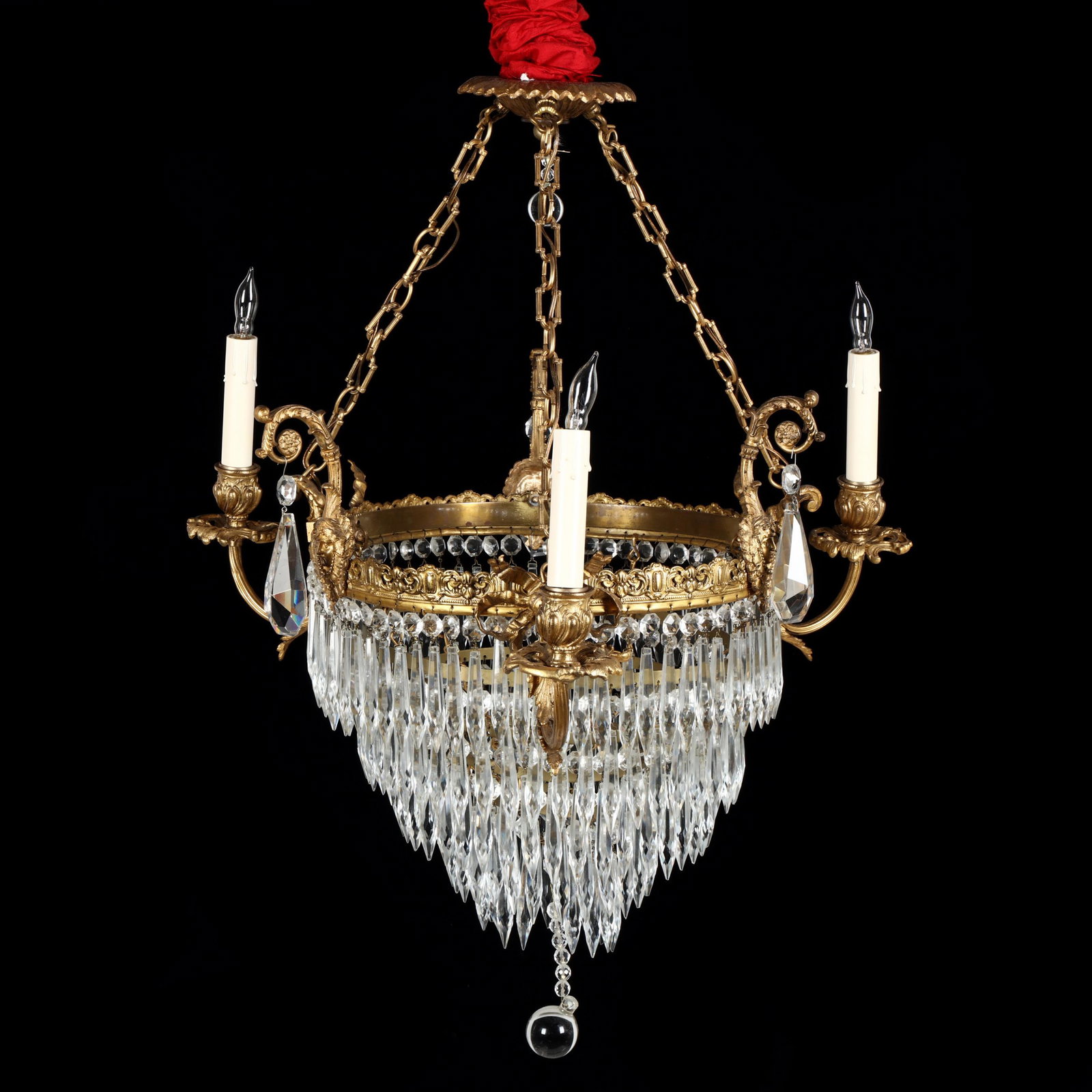 Vintage French Drop Prism Chandelier: Vintage French Drop Prism Chandelier first haf of the 20th century, three-light form featuring ribbon, acanthus leaf, and mask decoration, with central five-tiered drop prism basket, with ceiling cap 