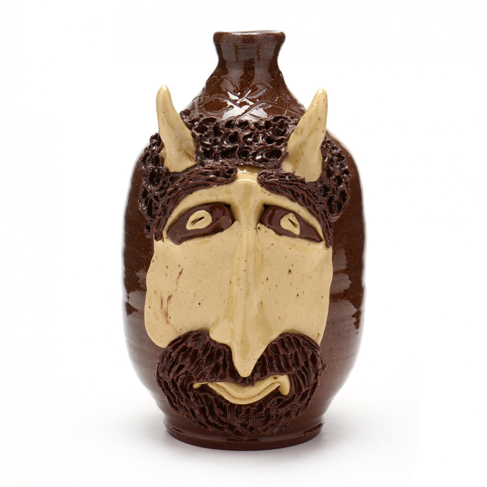 NC Folk Pottery, Billy Ray Hussey, Devil Jug: NC Folk Pottery, Billy Ray Hussey, Devil Jug Mid 1980s, brown glazed earthenware with yellow slip face and horns, carved and curly clay hair, inscribed on the bottom, "Owens BH". 9.75 in. From the col