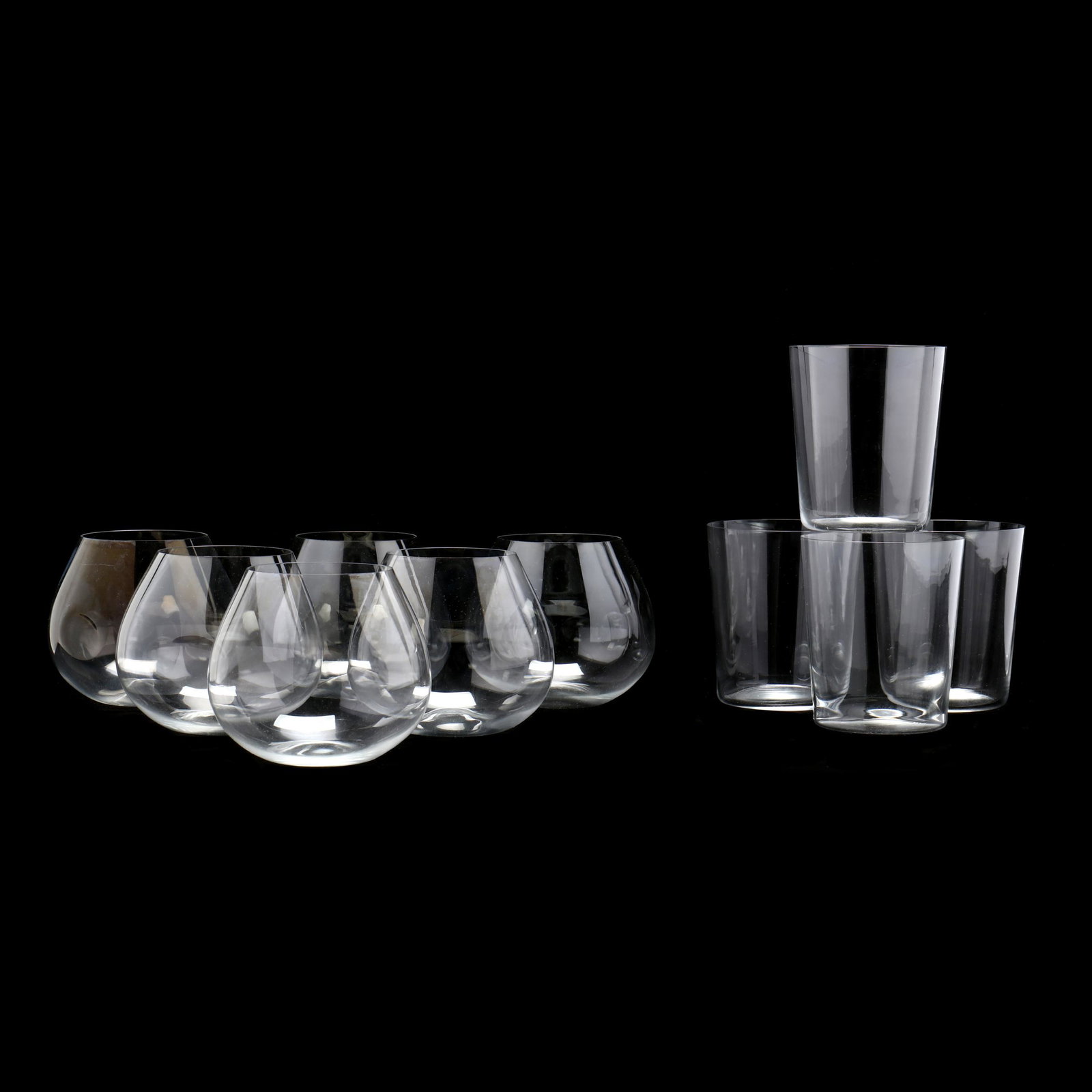 Elsa Peretti for Tiffany & Co. Glassware: Elsa Peretti for Tiffany & Co. Glassware (10) pieces, made in Spain, including a set of (6) Thumbprint brandy snifters (4 in.) and a set of (4) flat tumblers. Each marked. From the Collection of David