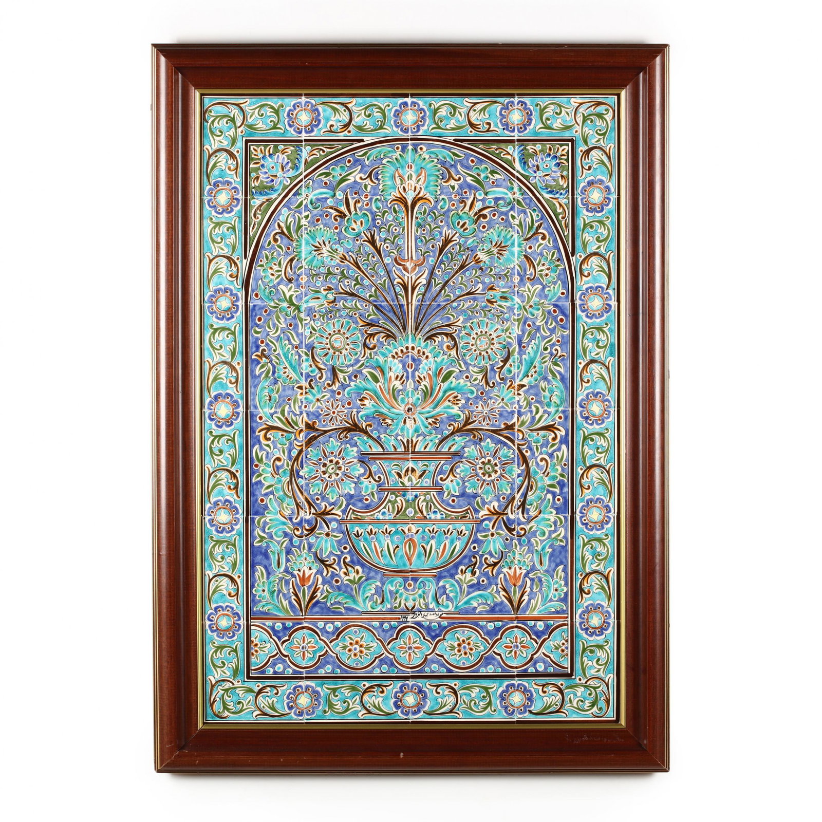 A Framed Mural of Middle Eastern Tiles: A Framed Mural of Middle Eastern Tiles twenty-four tiles with glazed and hand-painted metallic decoration within a hardwood frame, with Arabic inscription and dated 1999 beneath the central urn. DOA 4