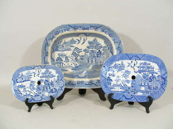 Three Pieces of Blue Willow Ironstone,: Three Pieces of Blue Willow Ironstone, transfer decorated, two strainers and a platter, all unmarked; the platter w/crazing and some discoloration, 1.75"h x 17"l x 14"w; one strainer w/edge chip, 12.5