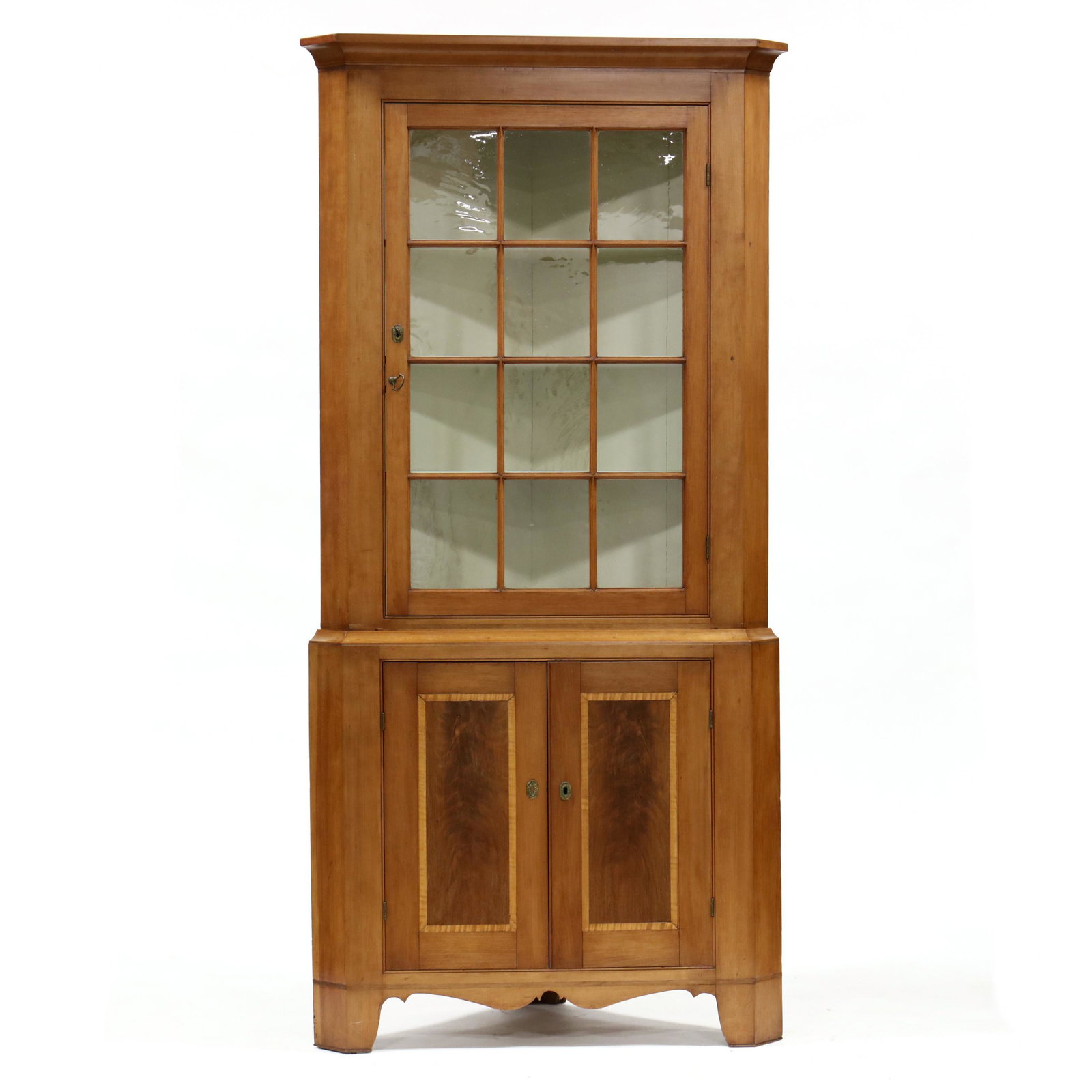 Pennsylvania Federal Inlaid Cherry Corner Cupboard: Pennsylvania Federal Inlaid Cherry Corner Cupboard Lehigh valley area, early 19th century, poplar secondary, two part form, upper case with applied cove molded cornice, single hinged door with twelve 