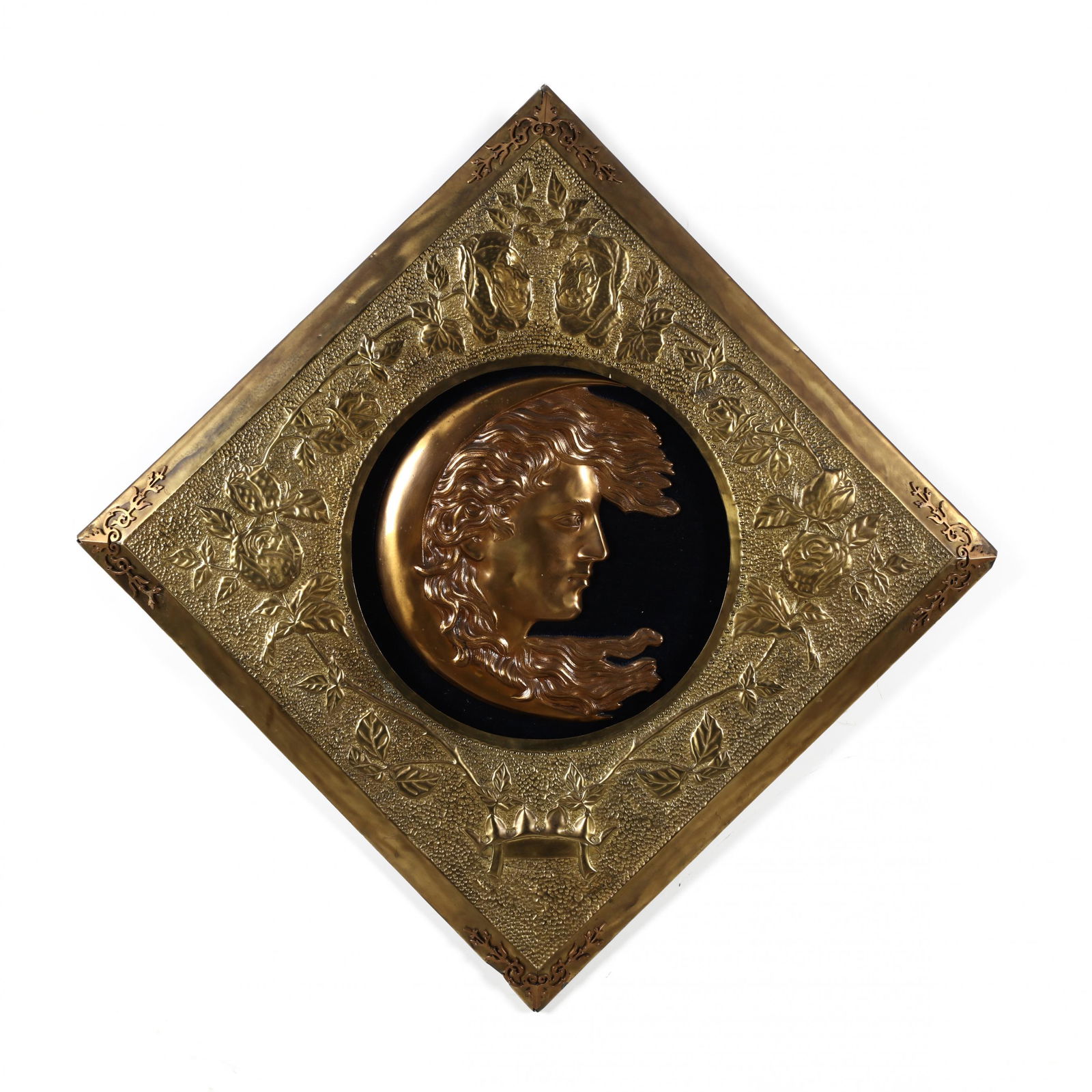 Art Nouveau Style Lunar Wall Plaque: Art Nouveau Style Lunar Wall Plaqueearly 20th century, cast brass, unmarked, crescent moon with a figure's profile with flowing hair center mounted on dark fabric backing, frame with brass-clad face a