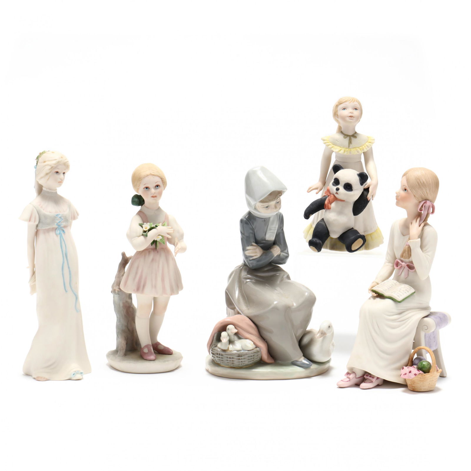 Four Cybis Bisque Figures and a Lladro Figure: Four Cybis Bisque Figures and a Lladro FigureAll portraying young girls (tallest 8.5 in.). The Lladro depicts a girl with ducks (two ducks have broken heads. From the Estate of the late Ruth J. Hope,