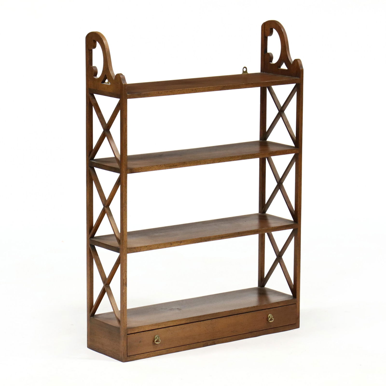 Kittinger, Williamsburg Adaptation, Chippendale Style: Kittinger, Williamsburg Adaptation, Chippendale Style Mahogany Wall Shelfmid 20th century, three shelves with fretwork panels over one drawer, flush base, labeled. 34.25 x 24 x 7 in. Additional high-