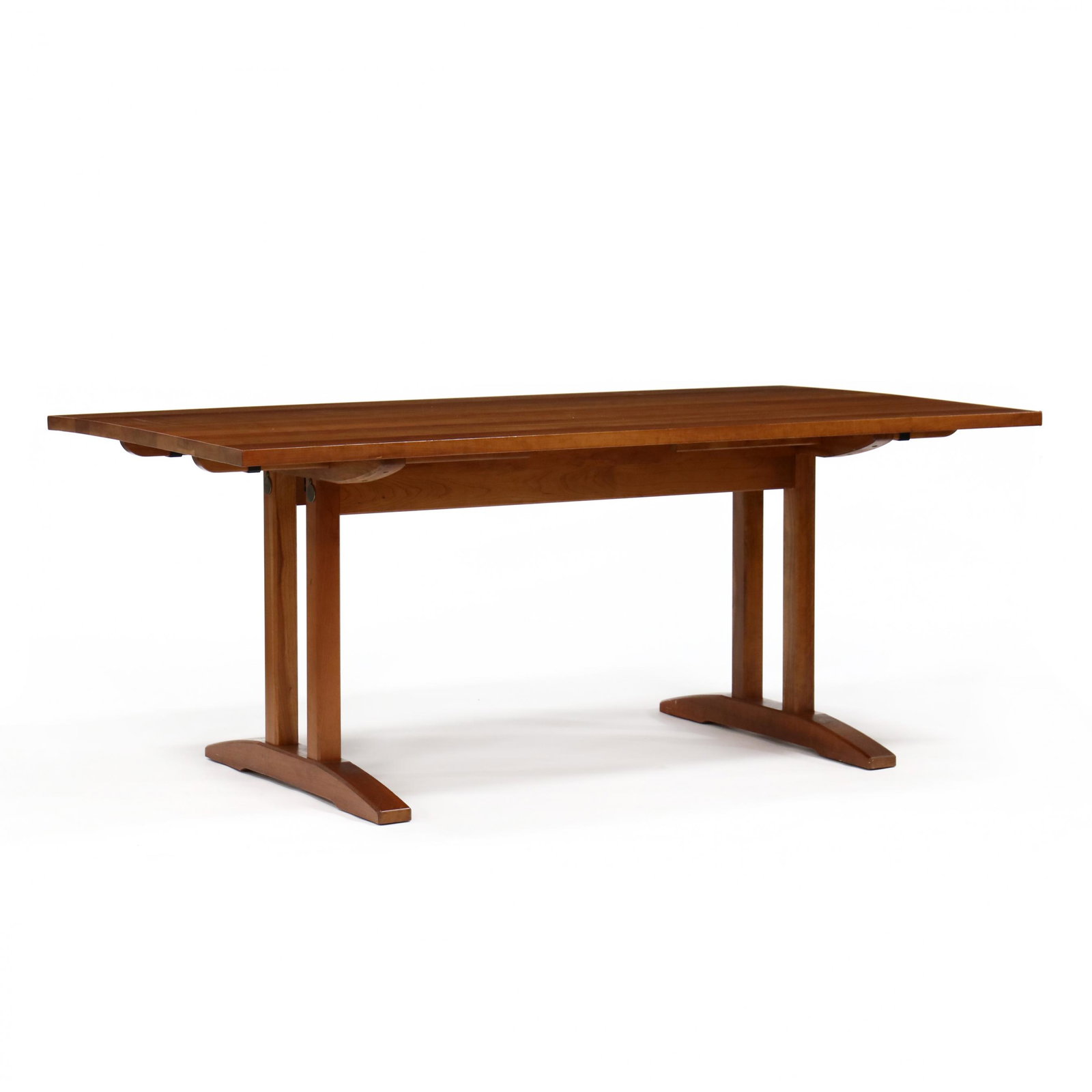 Stickley, Mission Cherry Trestle Base Dining Table and: Stickley, Mission Cherry Trestle Base Dining Table and Leaves late 20th century, solid rectangular top with end sliding loper supports for one leaf on each end, trestle form base with elongated shoe f