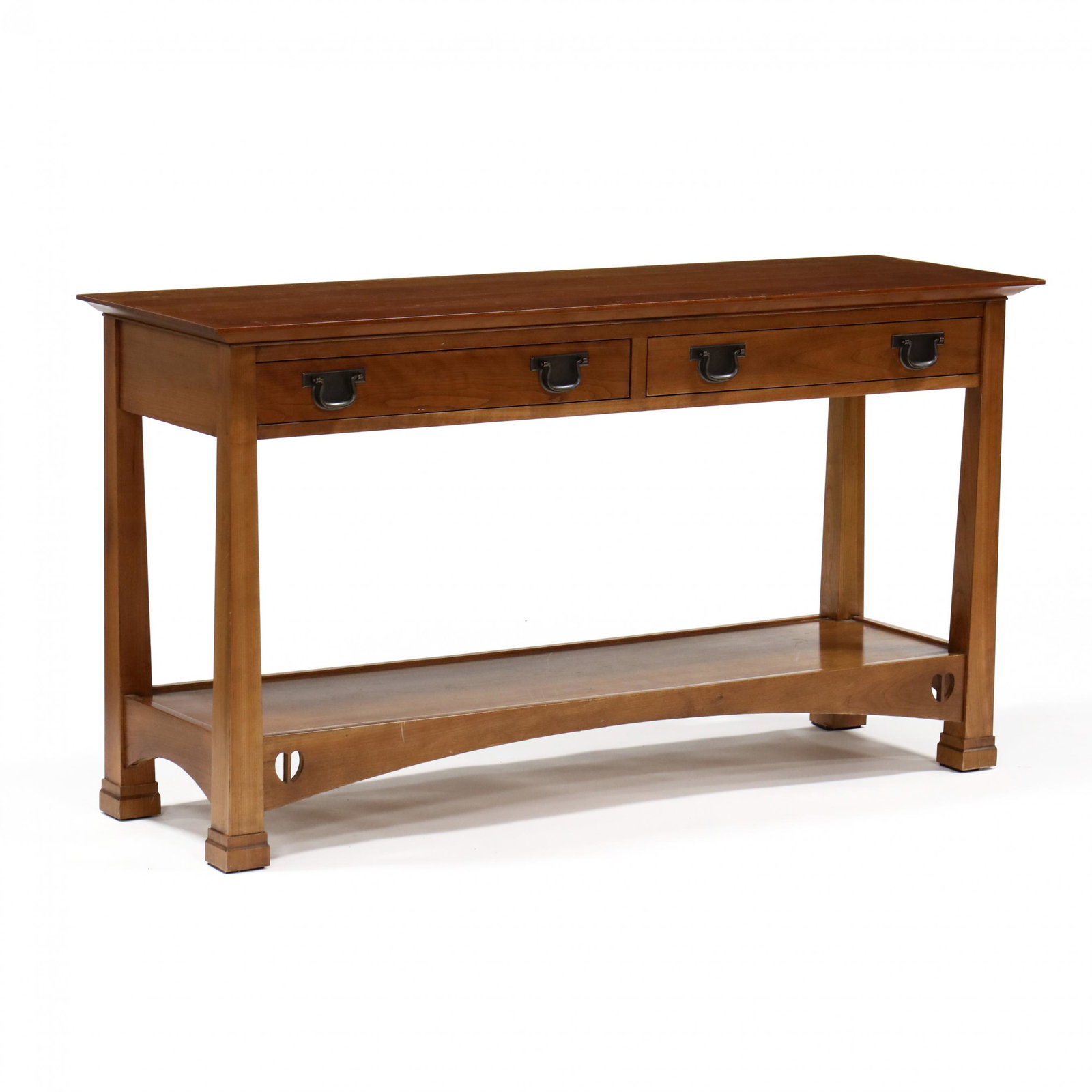 Stickley, Mission Cherry Console Table / Server: Stickley, Mission Cherry Console Table / Server late 20th century, rectangular form, two drawers with patinated copper pulls, lower shelf with arched skirt and reticulated corners on block feet, label