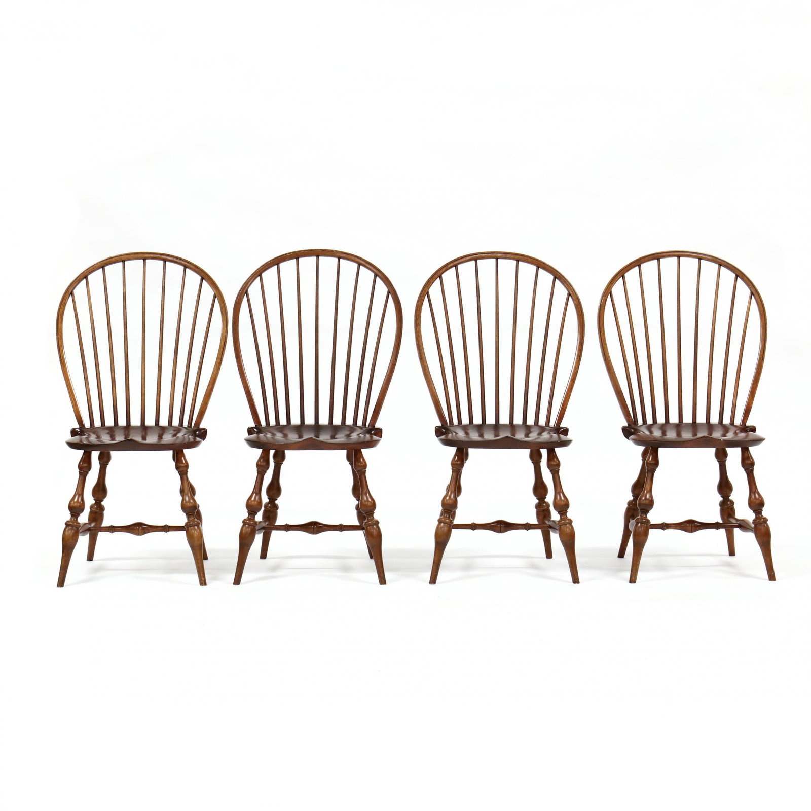 D.R. Dimes, Set of Four Windsor Side Chairs: D.R. Dimes, Set of Four Windsor Side Chairs second half 20th century, pine, oak and mixed woods, continuous crest rail, nine-spindle back, saddle seat, turned legs and stretcher base, labeled. 38 x 21