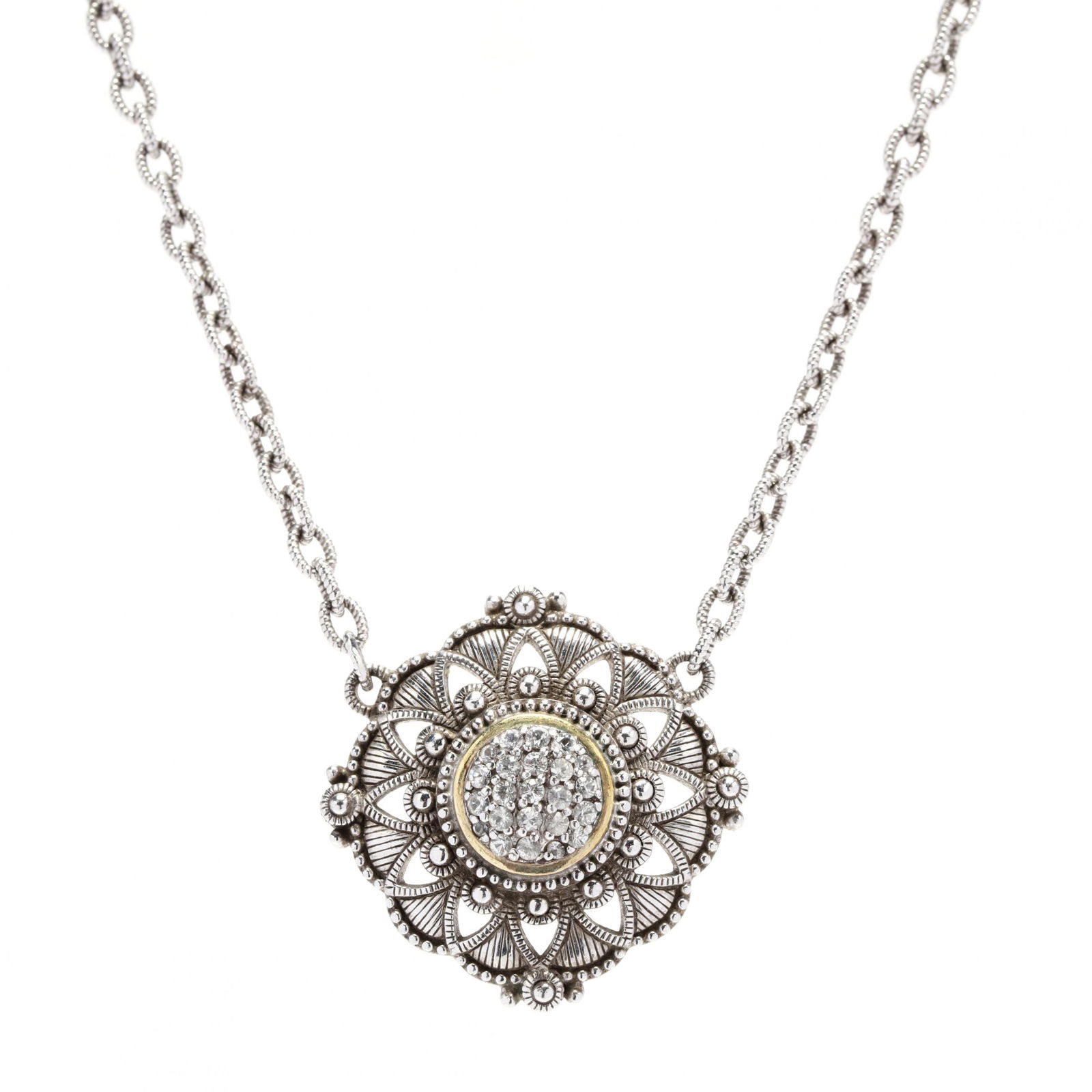 18KT Gold, Sterling Silver, and Gem-Set Necklace,: 18KT Gold, Sterling Silver, and Gem-Set Necklace, Judith Ripkaa stationary mandala motif pendant with a cluster of round cut, central colorless stone melee in a gold bezel, suspended on a fancy cable