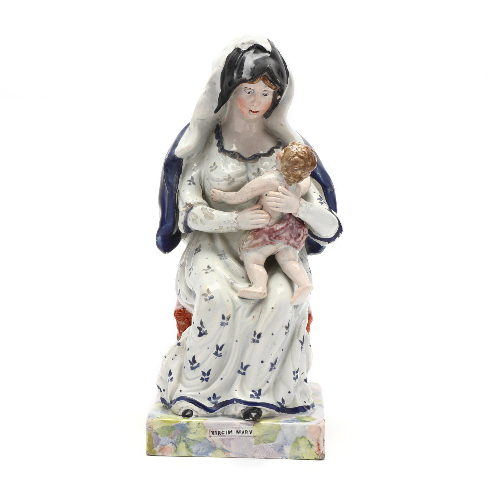Pearlware Figurine of Virgin Mary: Pearlware Figurine of Virgin MaryStaffordshire pottery pearlware figure of â€œVirgin Mary”, early 19th century period circa 1820, well-formed with detailed structure and colored enamels. Re