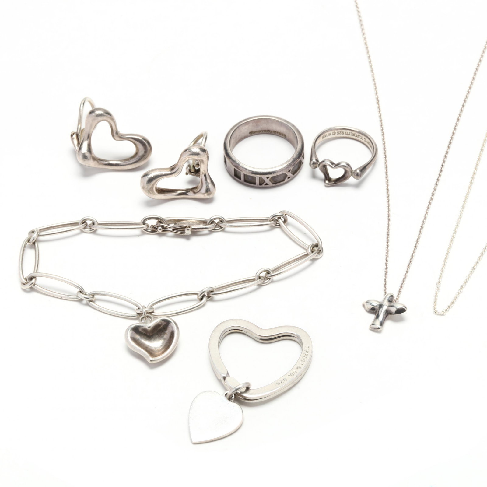 Group of Sterling Silver Jewelry Items, Tiffany & Co.: Group of Sterling Silver Jewelry Items, Tiffany & Co. to include two fine link necklaces signed Tiffany & Co. / Peretti and one with signed pendant (16 in.); a band signed Tiffany & Co. / 1995 / 925 /