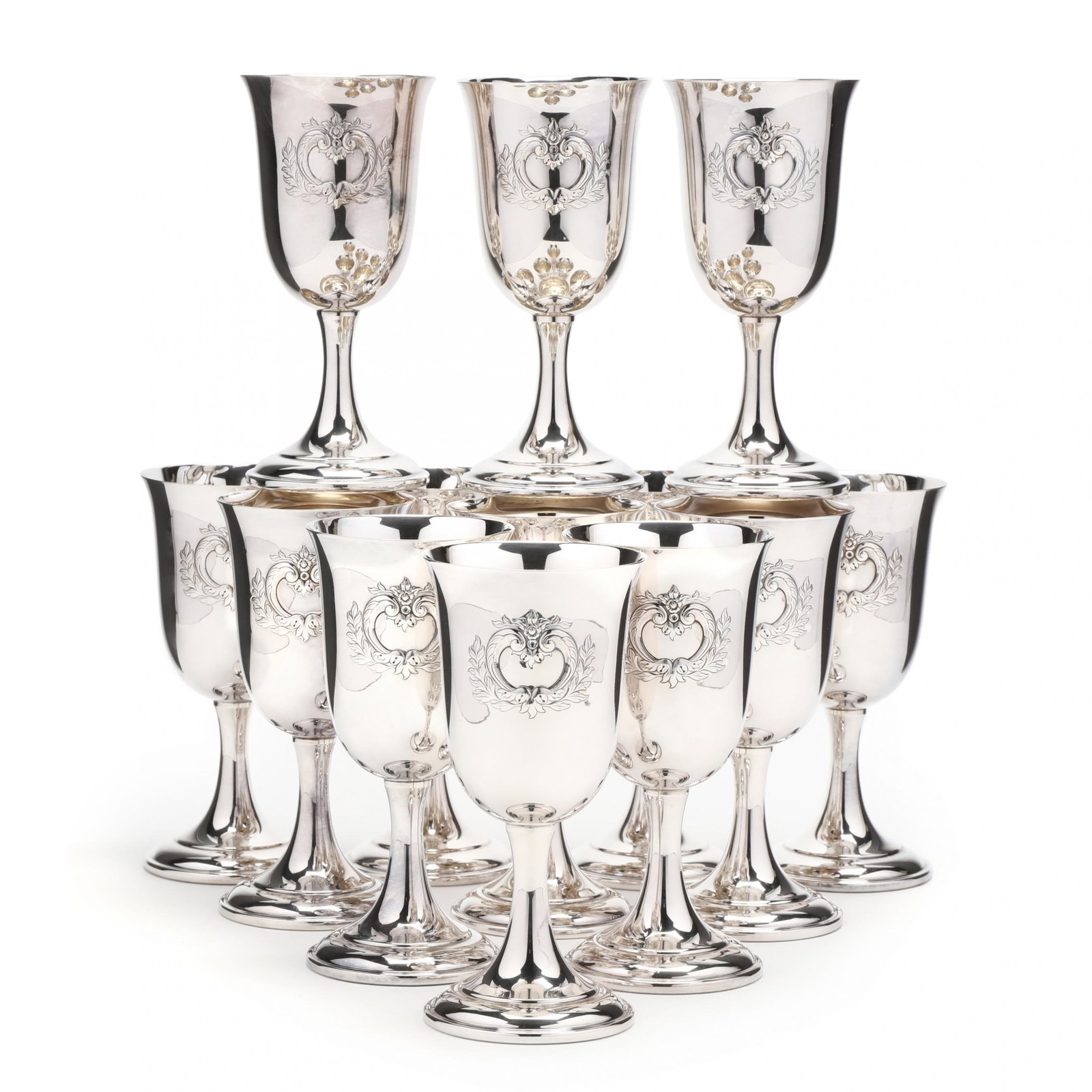 Set of Thirteen Silverplate Goblets by International: Set of Thirteen Silverplate Goblets by International Silver / Wilcox mid-20th century, model number 195, each with "International Silver Co./ Wilcox / IS" hallmark to undersides, no monograms. 6 1/2 i