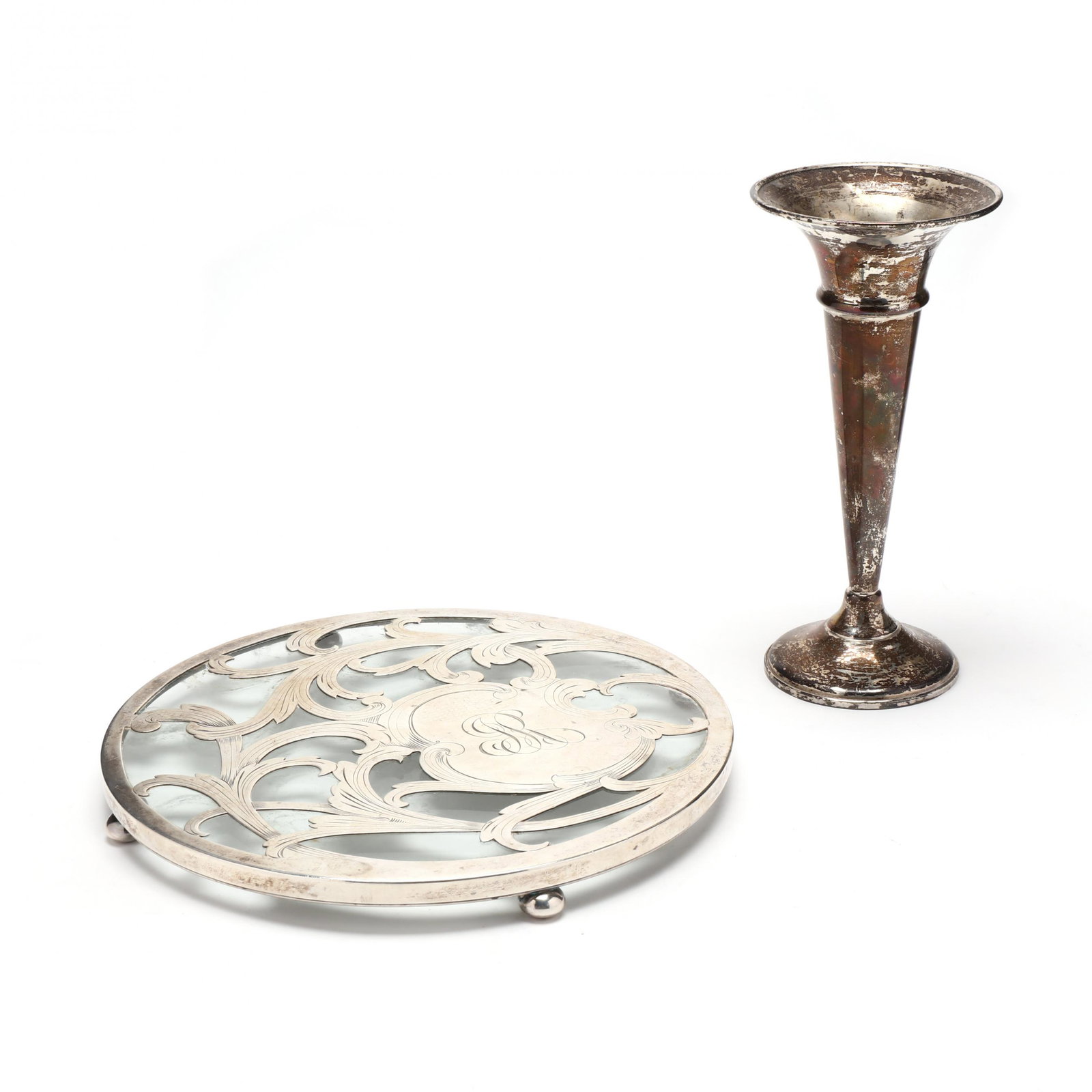 American Sterling Silver Overlay Trivet and Bud Vase: American Sterling Silver Overlay Trivet and Bud Vase the trivet with mark of Reed & Barton, "JR" monogram to top, on four ball feet (8 in.); the bud vase with mark of Fisher Silversmiths Inc., no mono