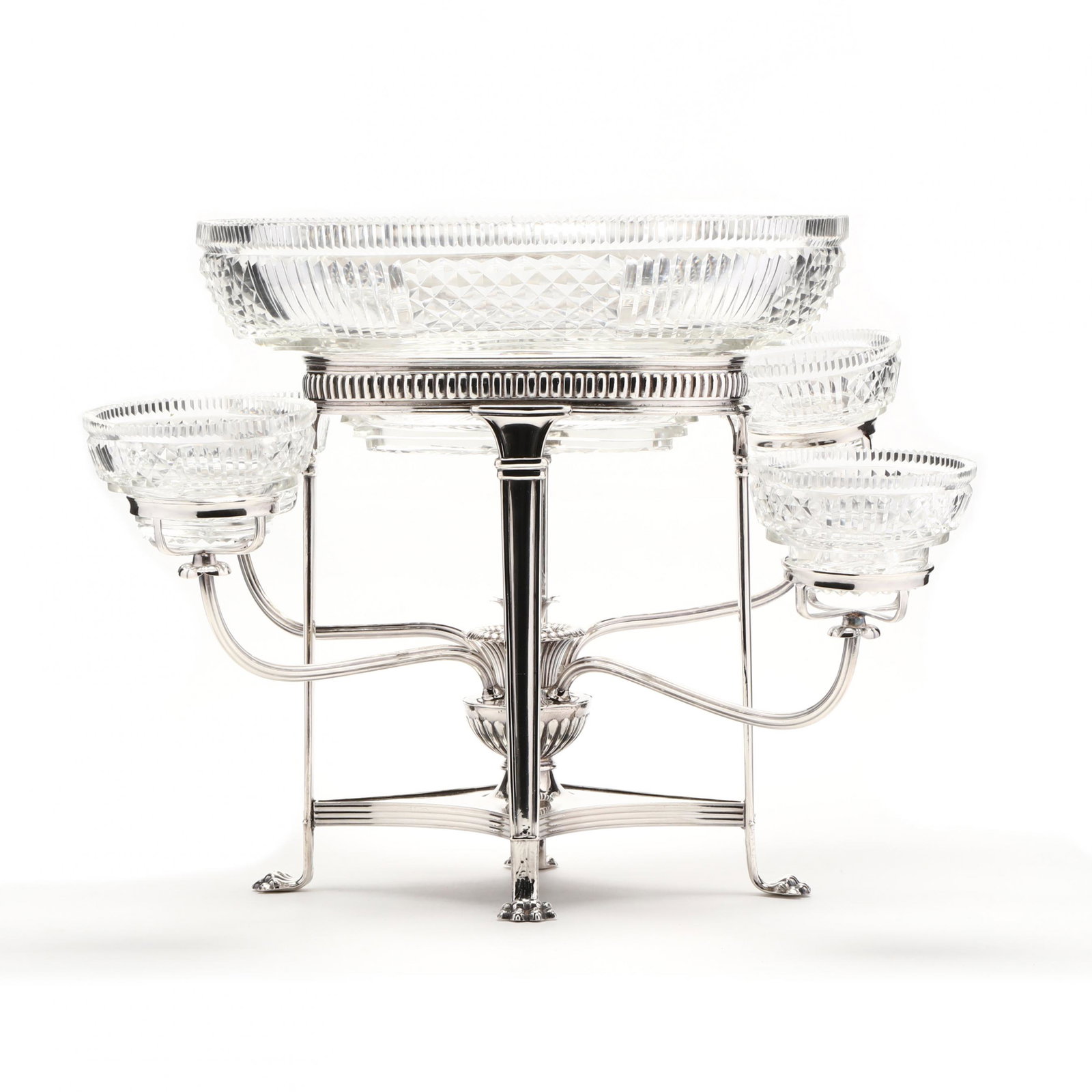 Antique English Regency Style Silverplate Epergne: Antique English Regency Style Silverplate Epergne circa 1900, unmarked, with cut glass bowls, the center bowl raised on four tall elegant legs terminating in paw feet, central stretcher with urn form 