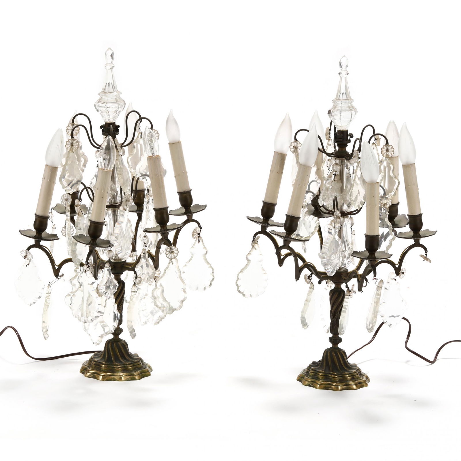 Pair of Antique Drop Prism Table Lamps: Pair of Antique Drop Prism Table Lampslate 19th century, six light candelabra (now electrified), adorned with cut crystal drop prisms, issuing from a spiral cast brass and cut crystal baluster standar