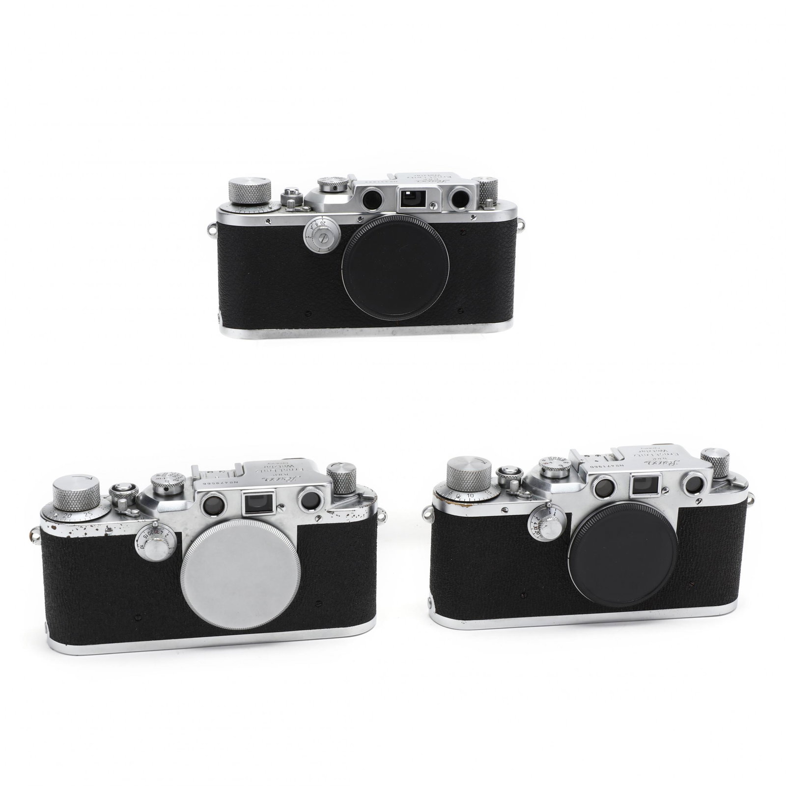 Three Vintage Leica D.R.P. Leitz Wetzlar Cameras, Each: Three Vintage Leica D.R.P. Leitz Wetzlar Cameras, Each Without LensGermany, No.'s 331933 (1939), 471960 (1949), 479566 (1949) rangefinder cameras. 2-3/4 x 5-1/2 x 1-1/2 in. Private Collection of a Gen