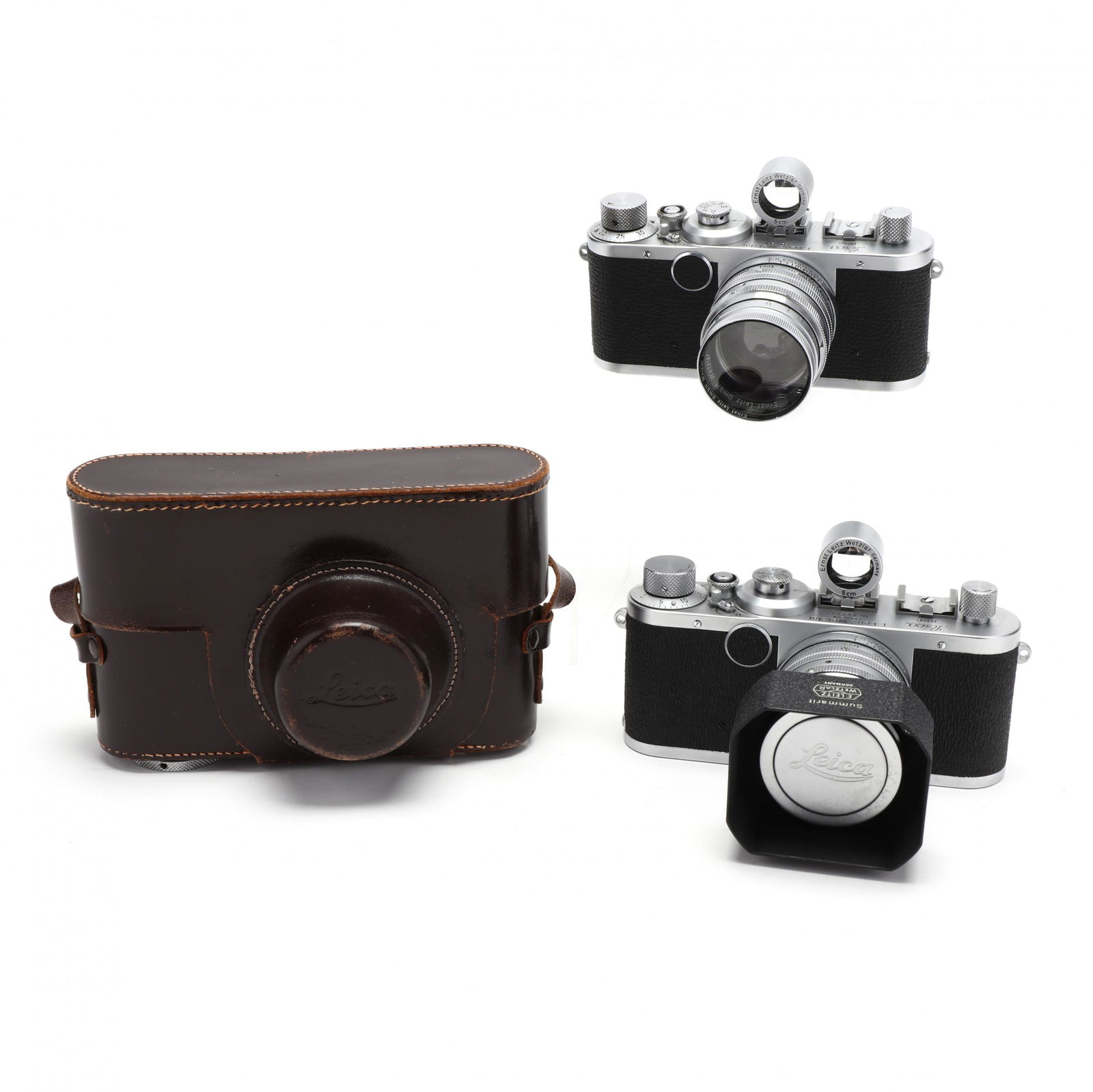 Two Vintage Leica D.R.P. Leitz Wetzlar Rangefinder: Two Vintage Leica D.R.P. Leitz Wetzlar Rangefinder Cameras With Lenses and ViewfindersGermany, No.'s 457247 (1949/50) and 562714 (1951), each equipped with Ernst Leitz GmbH Wetzlar Summarit f = 5 cm 1