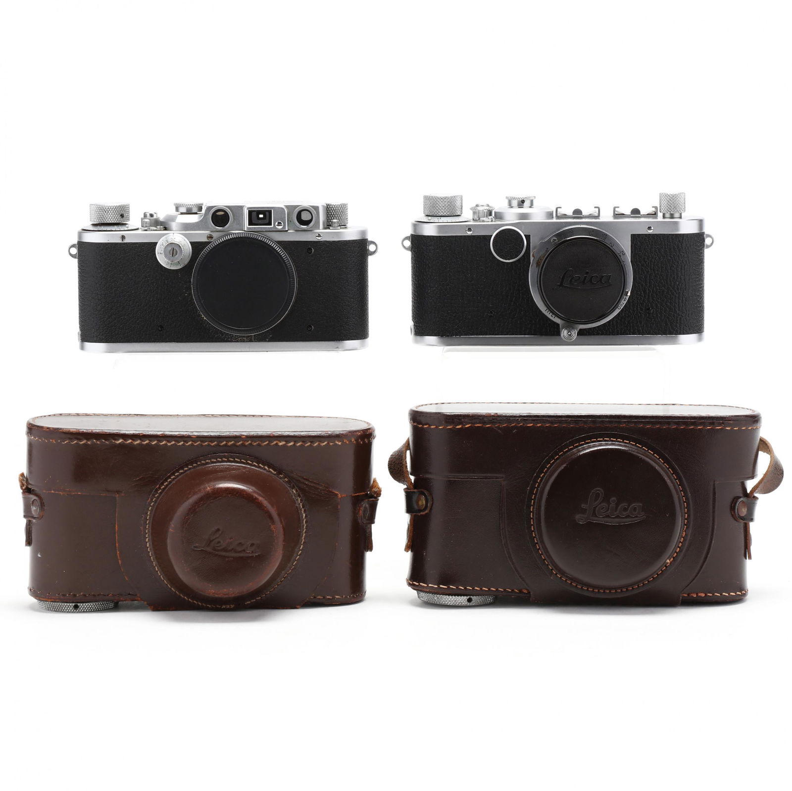 Pair of Vintage Leica D.R.P. Leitz Wetzlar Cameras, One: Pair of Vintage Leica D.R.P. Leitz Wetzlar Cameras, One With LensGermany, rangefinder cameras, one No.'s 285800 (circa 1938) and 458978 (1949/50) with Leitz Elmar f=3,5cm 1:3,5 lens, each includes Lei
