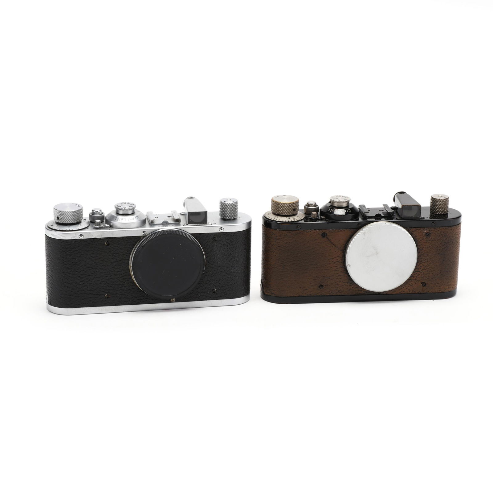 Two Vintage Leica D.R.P. Leitz Wetzlar Cameras, each: Two Vintage Leica D.R.P. Leitz Wetzlar Cameras, each without LensGermany, No.'s 200668 (1936) and 261972 (1937), rangefinder cameras, each without a lens. 2-3/4 x 5-1/4 x 1-1/2 in. Private Collection