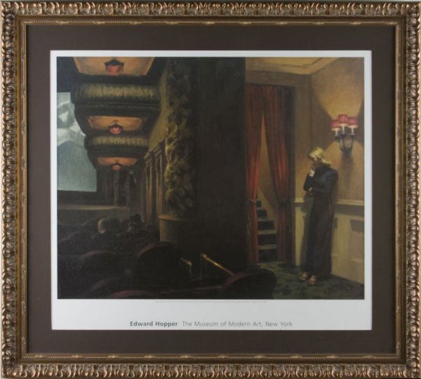 Edward Hopper (NY, 1882 - 1967), Framed Print: Edward Hopper (NY, 1882 - 1967), Framed Print "New York Movie" (1939), lithograph published by the Metropolitan Museum of Art after 1996. Housed behind glass in copper-toned composition frame. SS 28 x