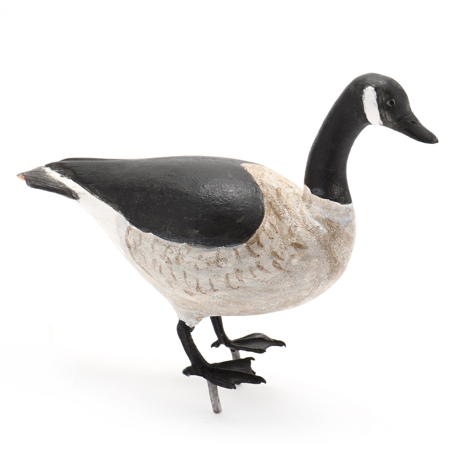 Miniature Canada Goose with Metal Feet: Miniature Canada Goose with Metal Feet A beautifully carved miniature goose with metal legs and feet, maker unknown. Length 7 in. Additional high-resolution photos are available at www.lelandlittle.co