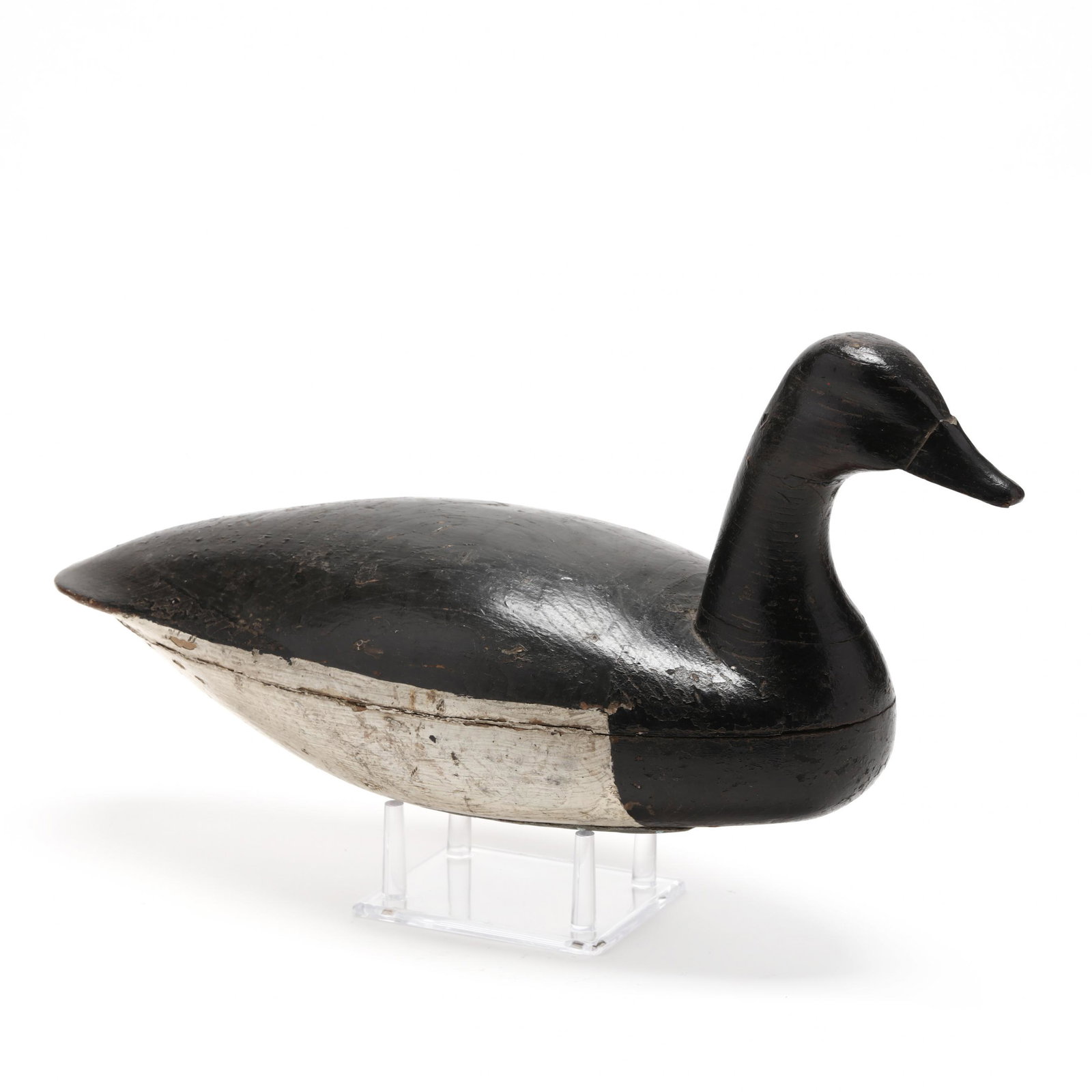 Taylor Johnson, Brant: Taylor Johnson, BrantTaylor Johnson (1853-1929) Point Pleasant, New Jersey. This exact decoy is published on page 107, plate 223 of New Jersey Decoys by Henry Fleckenstein. Branded JAH in the wood and