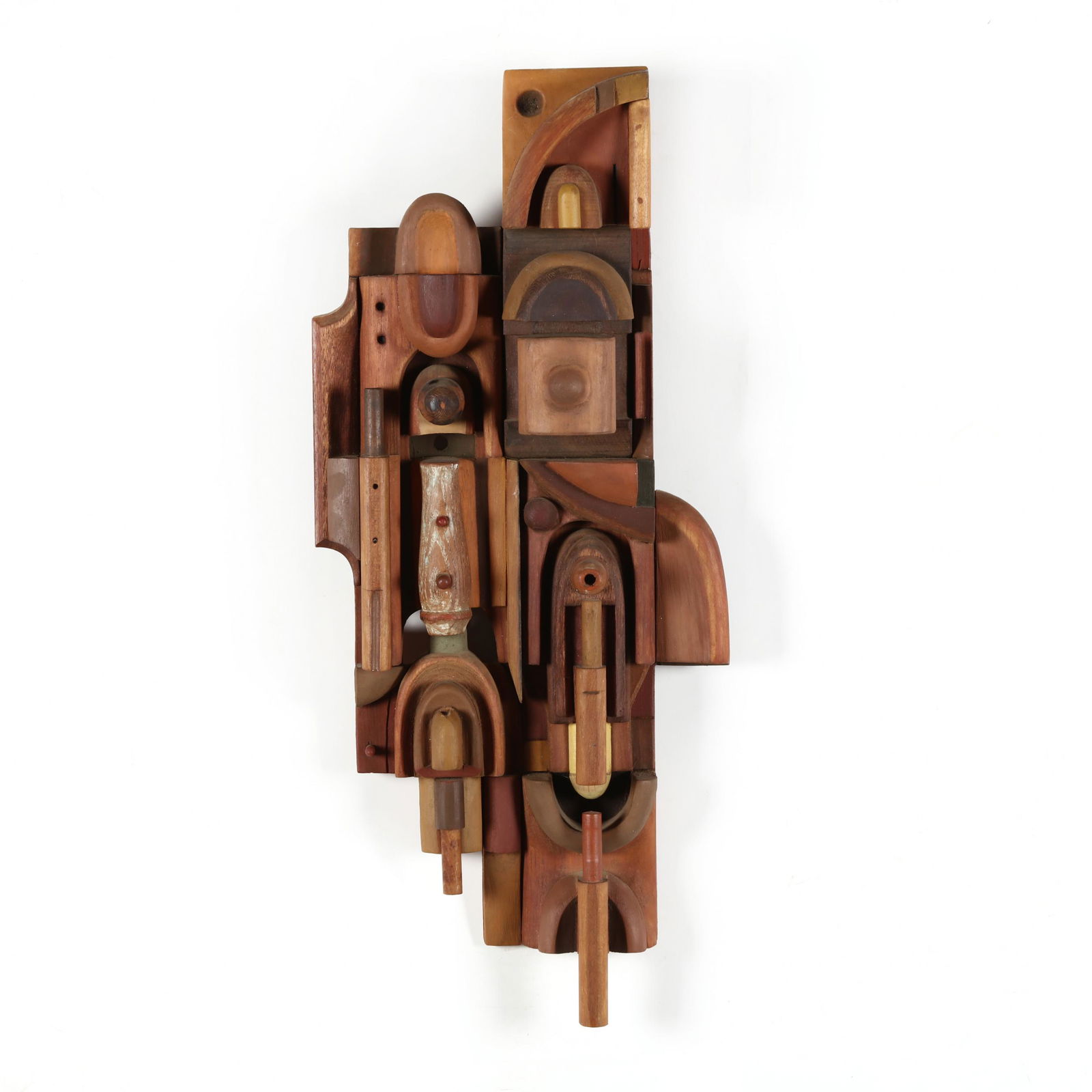 Dan Miller (ME), Tower , Assembled Wood Sculpture: Dan Miller (ME), Tower, Assembled Wood Sculpturelate 20th century, mixed woods with finished and painted surfaces, carved signature and title to verso, wall mount form. 25 x 10 in. Additional high-re