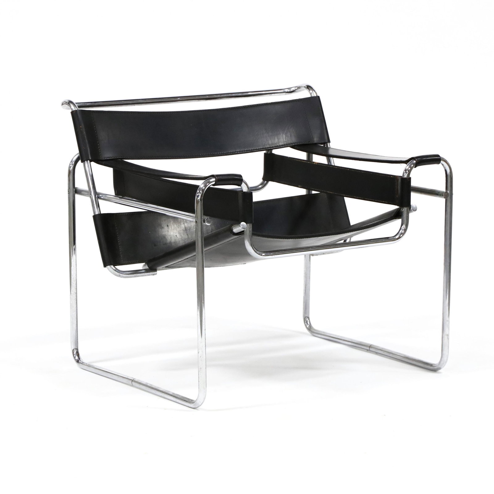 Marcel Breuer (Hungary, 1902-1981), Wassily Chair: Marcel Breuer (Hungary, 1902-1981), Wassily Chair 1970s, Italy, tubular polished steel frame with stitched black leather, underside of seat with partial Made in Italy label. 27.5 x 30.5 x 29 in. Being