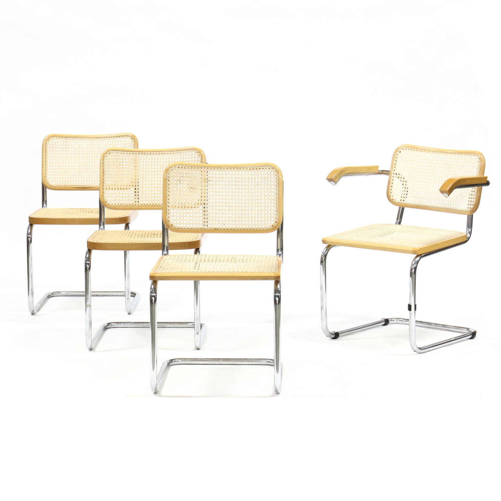 Marcel Breuer (Hungary, 1902-1981), Set of Four Cesca: Marcel Breuer (Hungary, 1902-1981), Set of Four Cesca Chairs post 1980, Italian, ash bentwood and polished steel frames with cane seats, including one armchair and three side chairs, some labeled Made