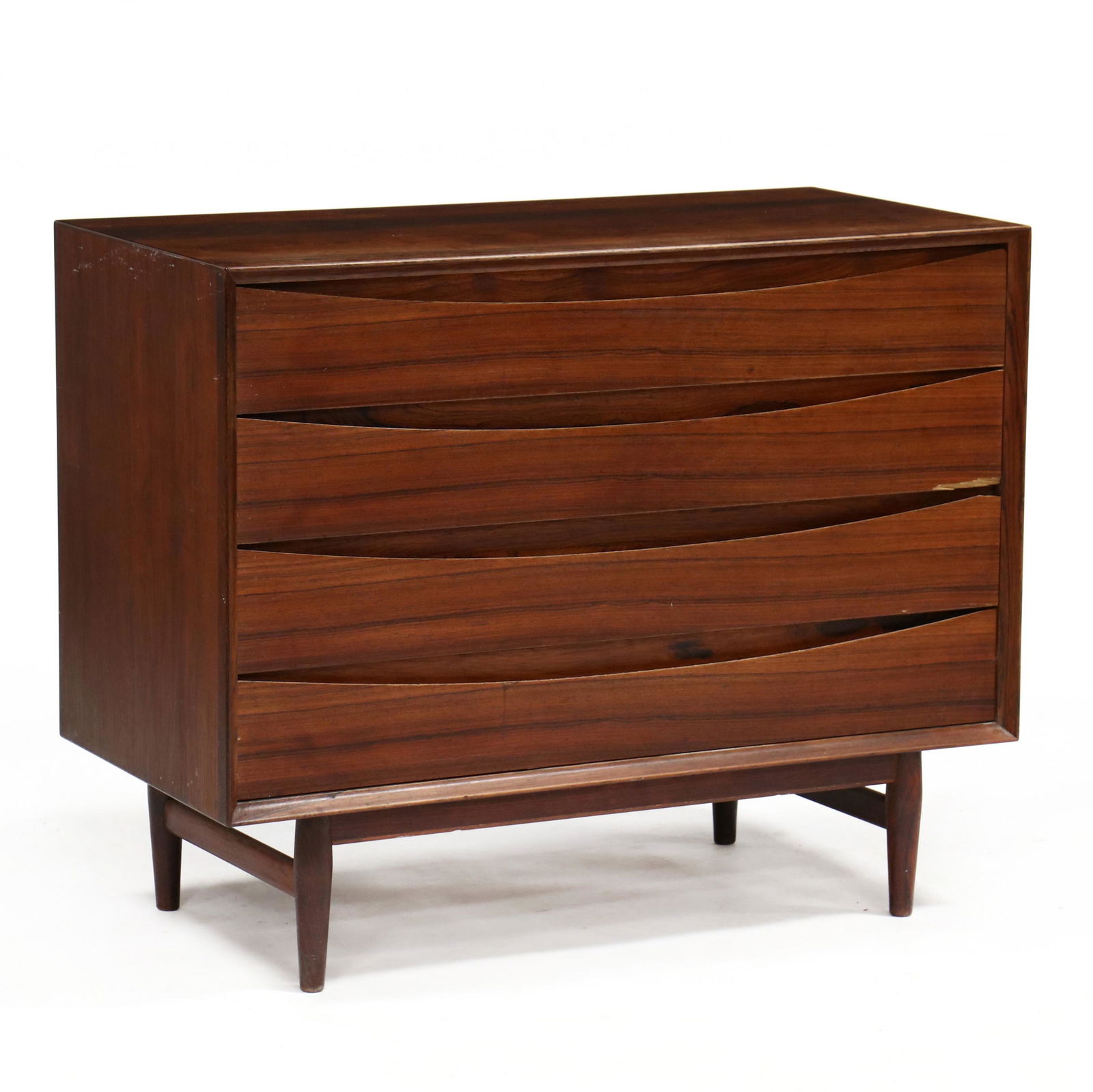 Arne Vodder (Denmark, 1926-2009), Rosewood Bachelor's: Arne Vodder (Denmark, 1926-2009), Rosewood Bachelor's Chest of Drawers1960s, Sibast Furniture, low profile chest with four recessed drawers having shaped lip pulls, raised on rounded tapered legs, lab