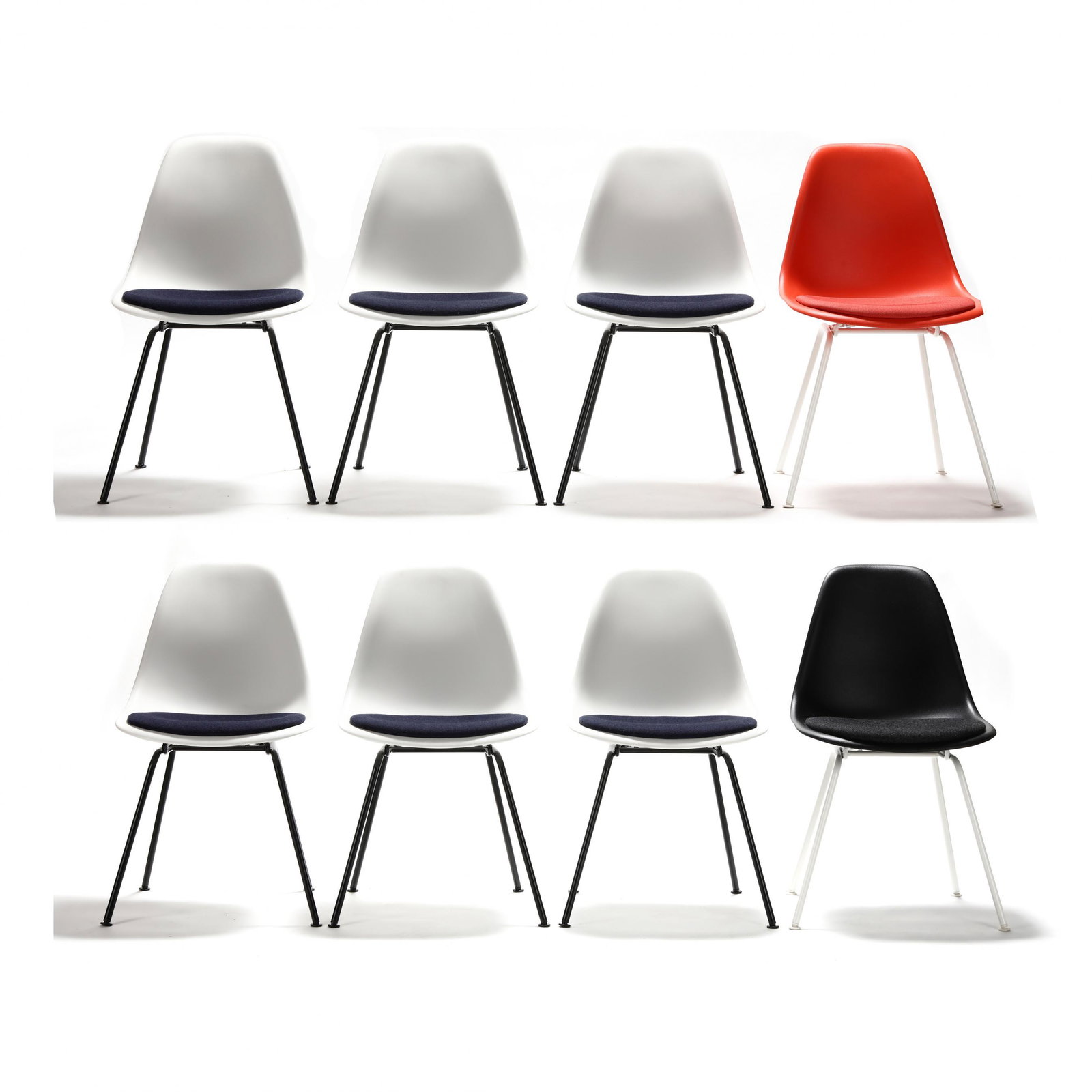 Charles and Ray Eames, Set of Eight Orange, White and: Charles and Ray Eames, Set of Eight Orange, White and Black Shell Chairs 2018/19 production, Herman Miller, including one black shell chair with black cushion on white powder coated metal legs, one or