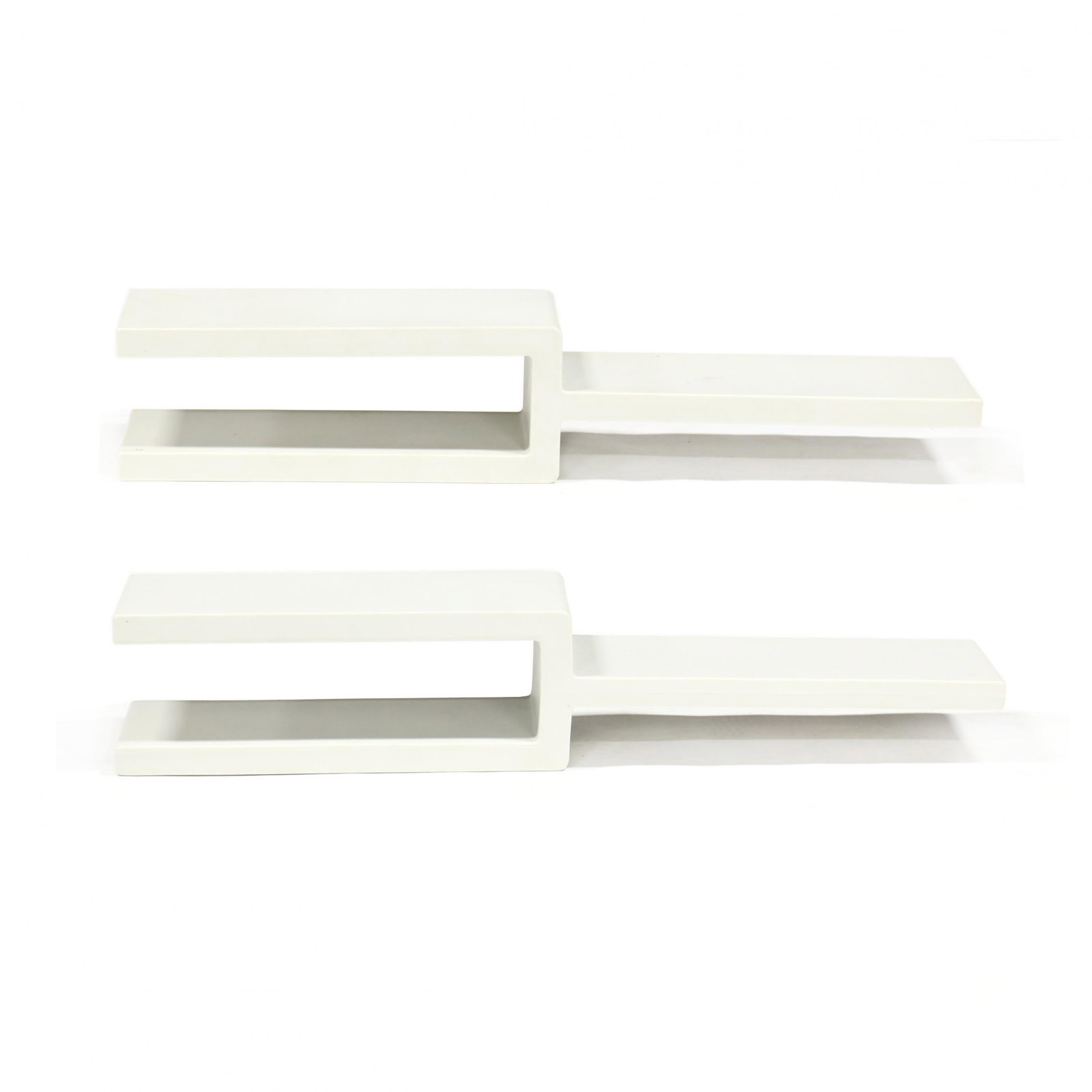 Pair of Modern Floating Wall Shelves, LivÃ¬t: Pair of Modern Floating Wall Shelves, LivÃ¬t Italy, contemporary, hollow plastic form, marked. 8.5 x 45 x 8.5 in. From the Collection of a Lady, Raleigh, North Carolina Additional high-resolution ph