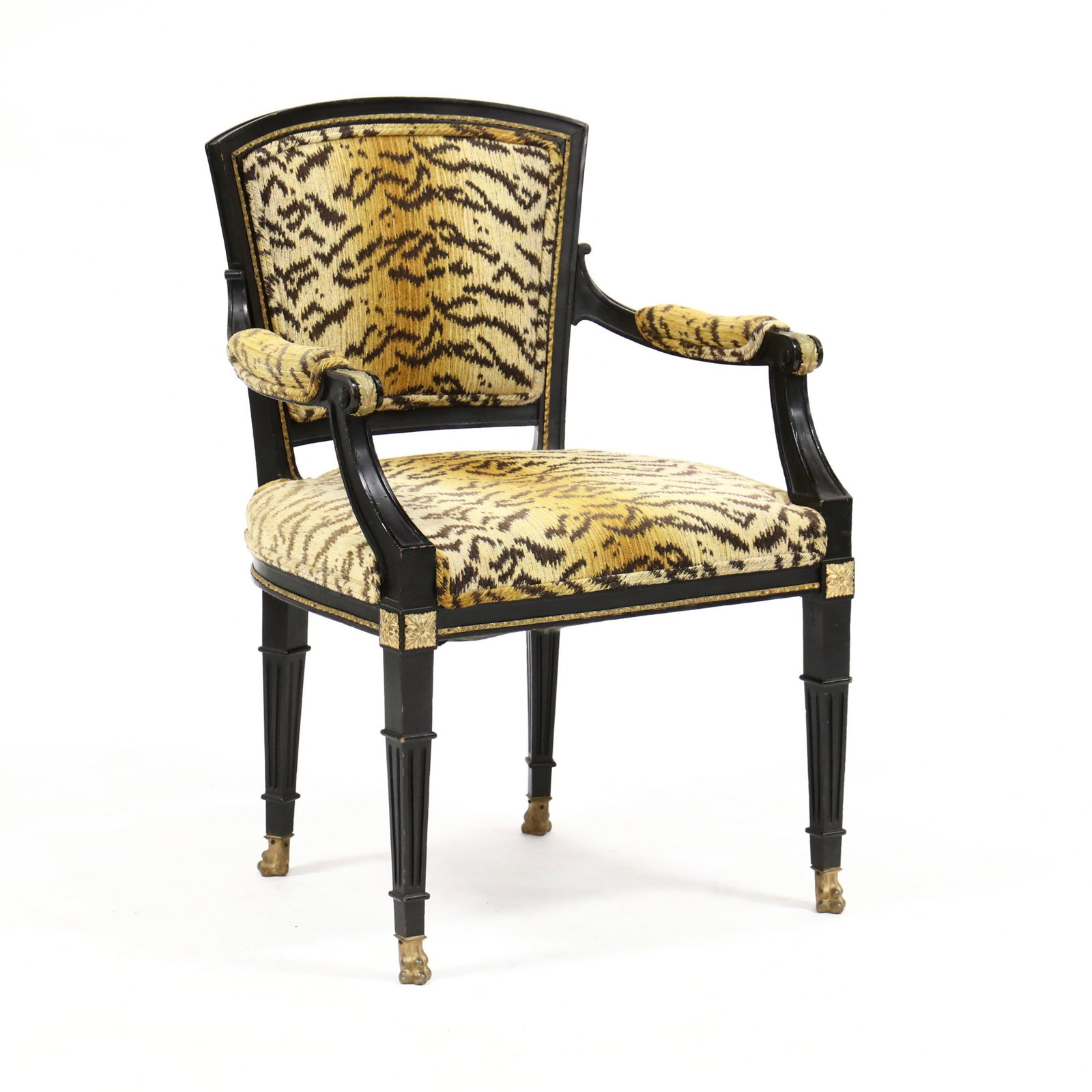 Louis XVI Style Ebonized and Ormolu Fauteuil: Louis XVI Style Ebonized and Ormolu Fauteuil circa 1900, later tiger print plush upholstery (possibly Scalamandre), the knuckles, seat corners and feet with ormolu mounts, all four legs are tapered an