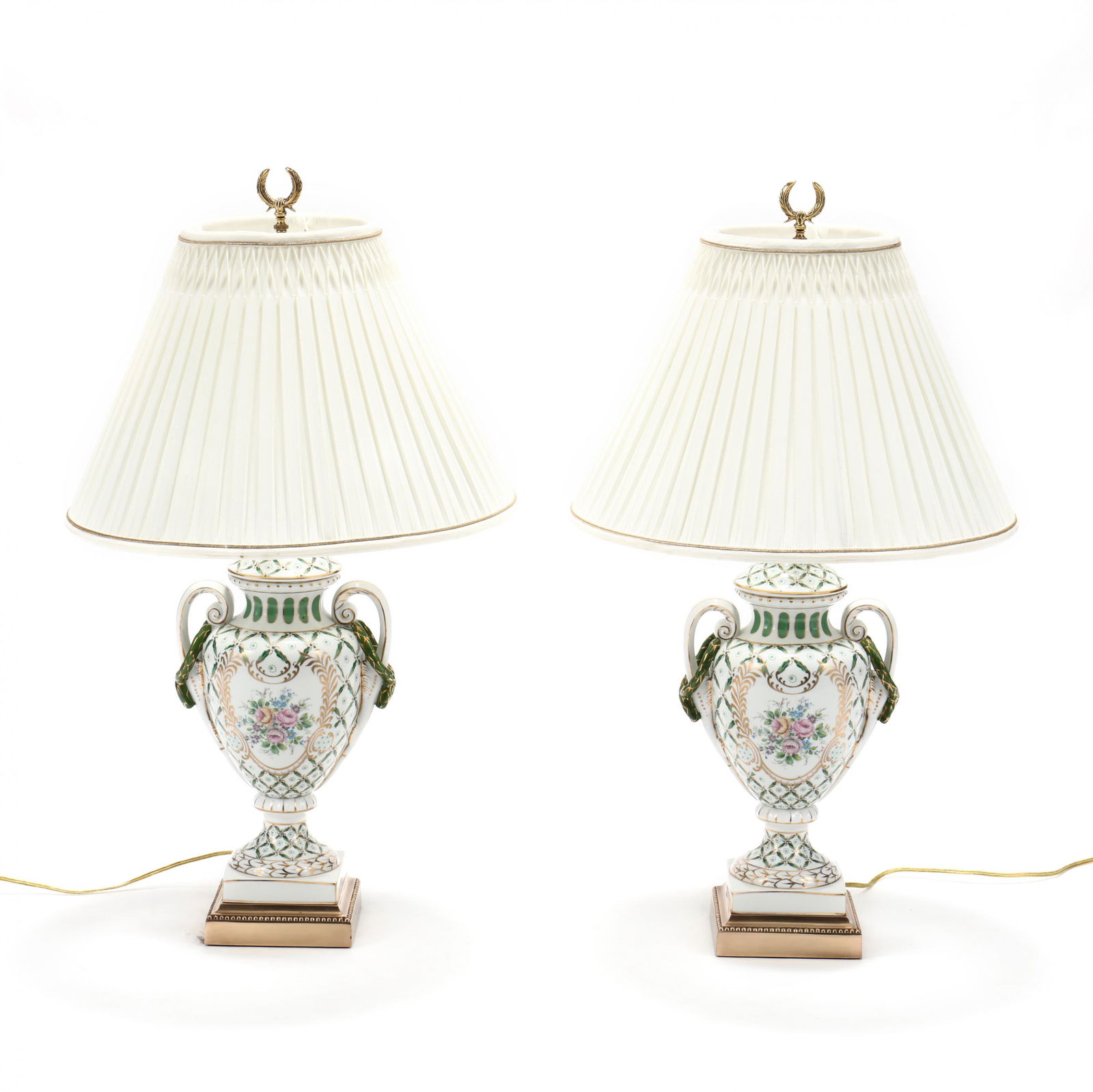 Frederick Cooper, Pair of Porcelain Urn Table Lamps: Frederick Cooper, Pair of Porcelain Urn Table Lampslate 20th century, transfer decorated double handled urns with laurel wreath and floral sprays, brass mounts, with pleated shades, labeled. HOA 30 in