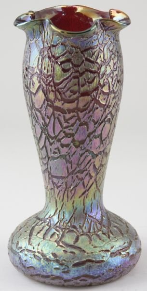 Unsigned Loetz Carved Art Glass Vase: Unsigned Loetz Carved Art Glass Vase Austria, 3rd quarter of 19th century, tall form with ruffled rim, tapered body to circular base, iridescent cut to ruby, bottom with ground and polished pontil. 10