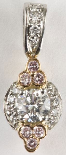 Pink and White Diamond Pendant, Charles Krypell: Pink and White Diamond Pendant, Charles Krypell set in 18KT white gold, centering upon one round brilliant cut diamond (.33 ct, G color, VS-1 clarity) surrounded by (11) round brilliant cut diamonds (