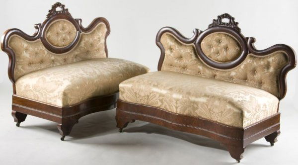 Pair of Diminutive Early Victorian Settees: Pair of Diminutive Early Victorian Settees mahogany and mahogany veneers, the frame having a pierced and carved crest, scrolled cameo back, flocked silk upholstery, serpentine seat rail over applied r