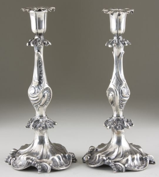 Pair of Silver Candlesticks, circa 1863: Pair of Silver Candlesticks, circa 1863 both in an ornate Rococo Revival style with floral and acanthus scrolling to shafts and bases, both with removable bobeches, both hallmarked "Humbert & Sohn" an