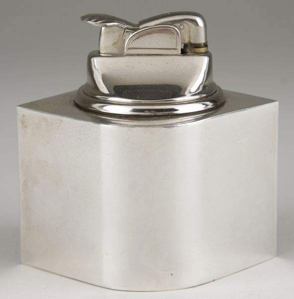 Cartier Sterling Silver Cigar Lighter: Cartier Sterling Silver Cigar Lighter marked on the underside "Cartier / Sterling / Weighted / 344" and with removable lighter insert by Evans. 3 in Private deceased estate collection, Chapel Hill, NC