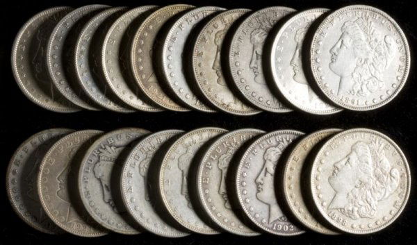 Roll of Circulated Morgan Silver Dollars: Roll of Circulated Morgan Silver Dollars (10) dated 1921; (10) various dates and mints 1880s - 1902. VG - AU.