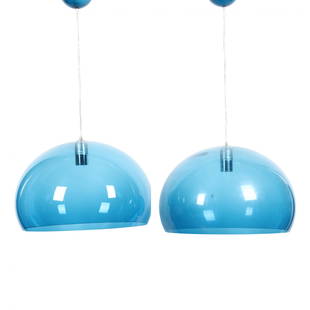 Ferruccio Laviani (It., b.1960) Pair of fl/y Blue: Ferruccio Laviani (It., b.1960) Pair of fl/y Blue Pendant Lampsfor Kartell, contemporary, blue plastic globes and ceiling caps, white painted cords, marked. Globes approximately 15 x 18 in. diameter