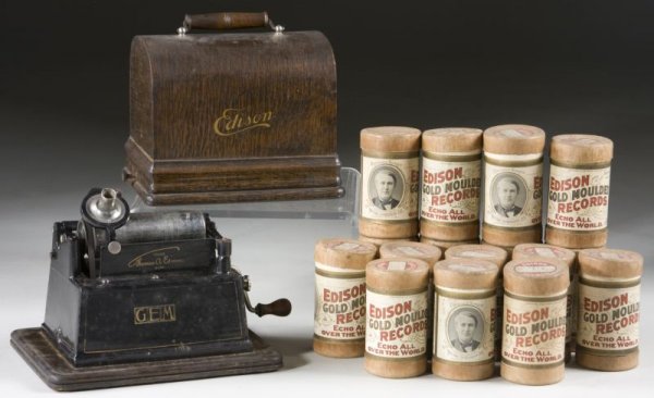 Edison Gem Cylinder Phonograph: Edison Gem Cylinder Phonograph serial # G185126, with Model C reproducer, oak case with "Gem" logo on front. This machine comes with (16) Edison cylinders in a period Hohner Accordian box. Case: 8 x 1