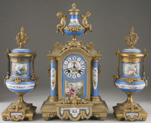 French Neoclassical Mantel Clock Garniture Set: French Neoclassical Mantel Clock Garniture Set circa 1880, spelter and porcelain mounted, the blue ground decorated with hand-painted Sevres style cartouches; the clock with time and strike movement h