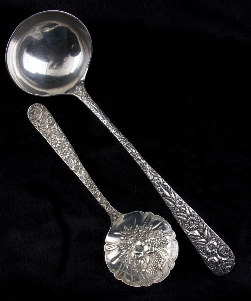 Two S. Kirk & Son Sterling Repousse Serving Items: Two S. Kirk & Son Sterling Repousse Serving Items the first a punch ladle, hallmarked "S. Kirk & Son 925/1000" and monogrammed "MB / 1891" (13.5 in.; 8.65 troy ozs.); the second a berry spoon with flo